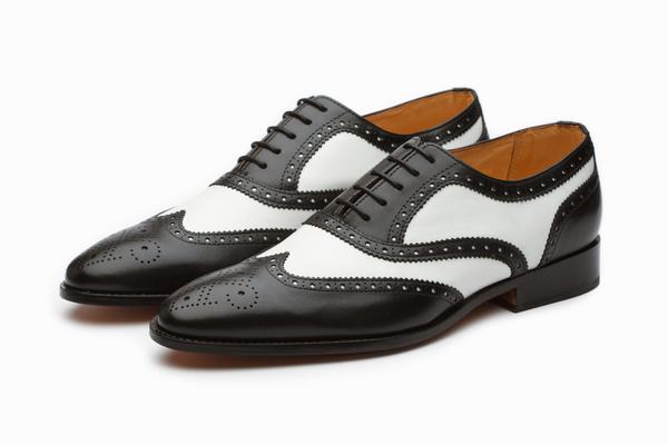 Black and white cheap wingtip dress shoes